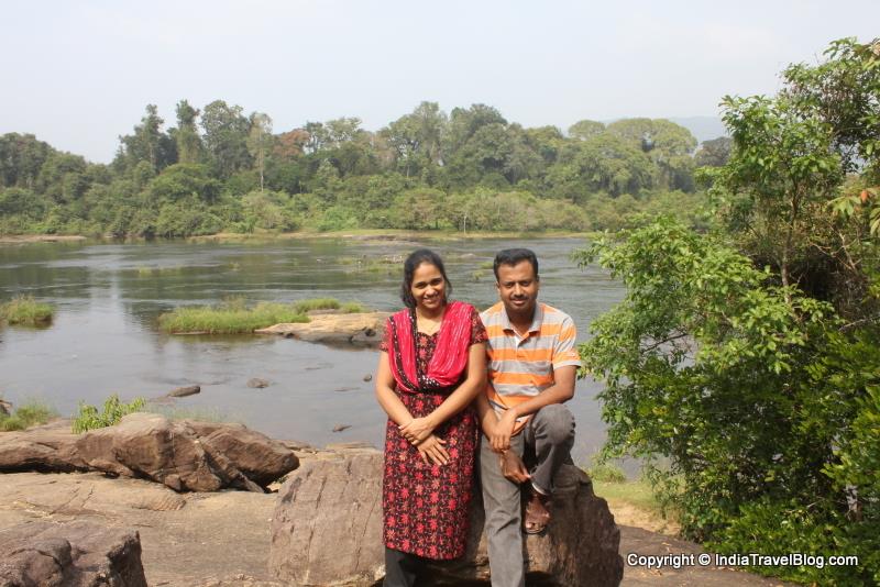 My wife and I for a photo. Periyar river is in the background