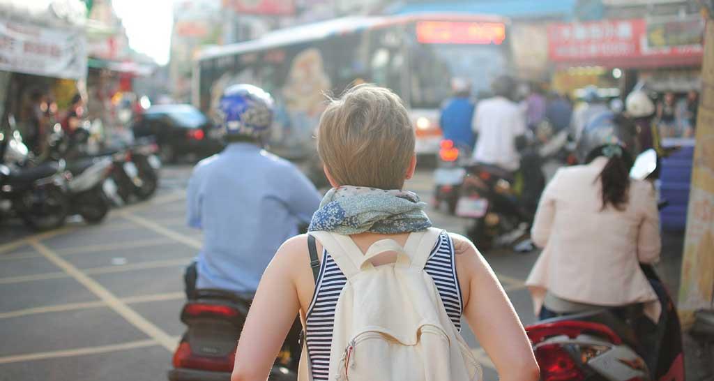 a lady with carry bag
